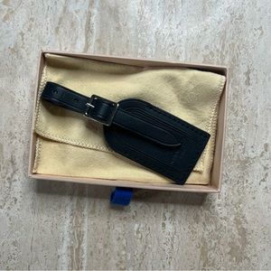 Louis Vuitton Vachetta luggage holder black